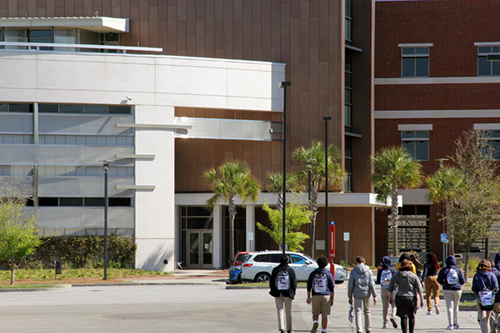 students walking to building